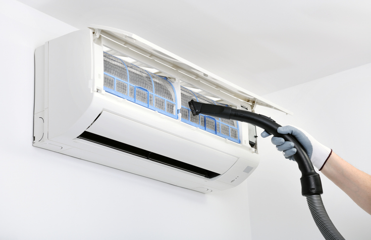 Using a vacuum cleaner to clean ductless system